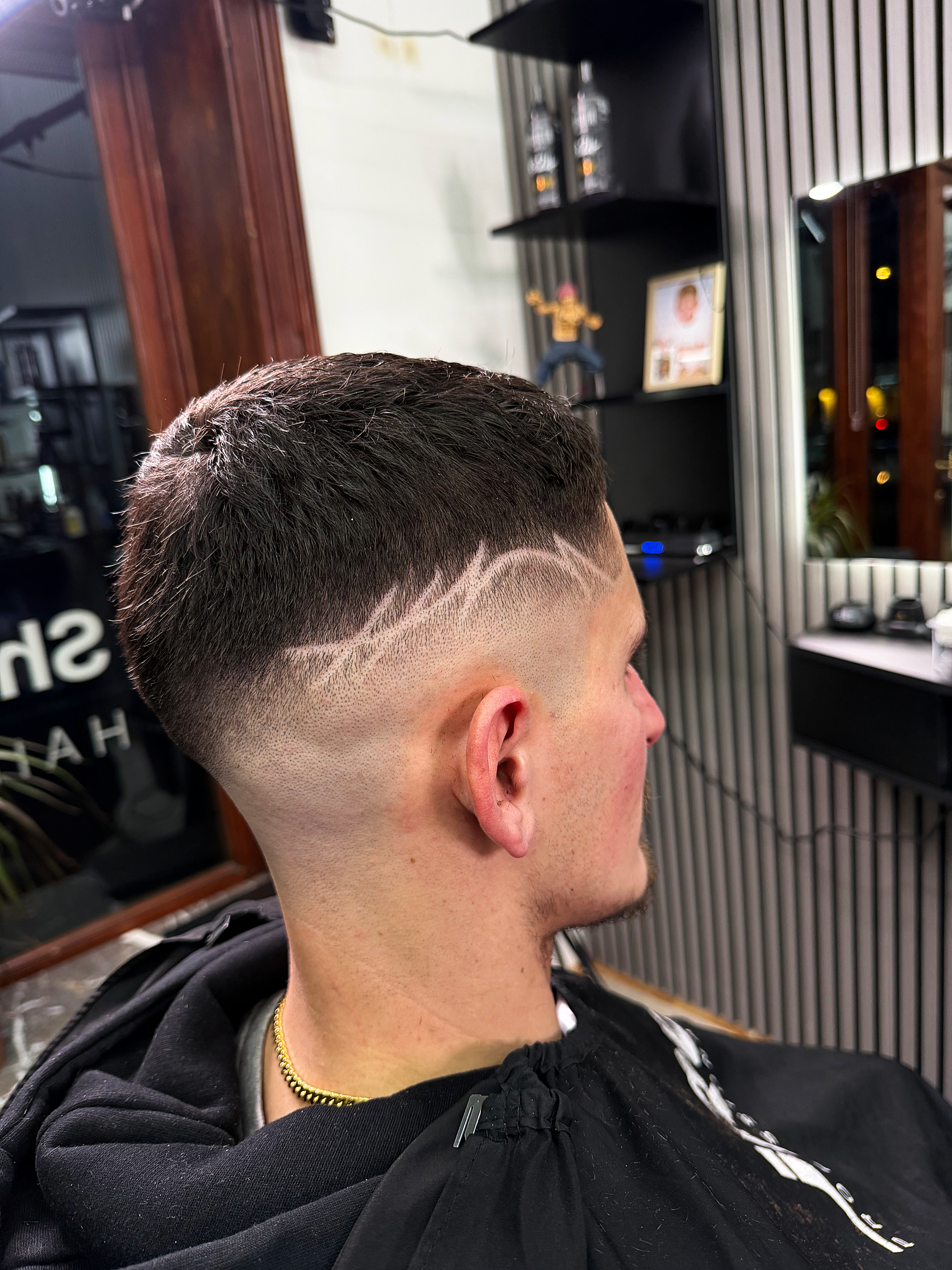 High taper fade with design